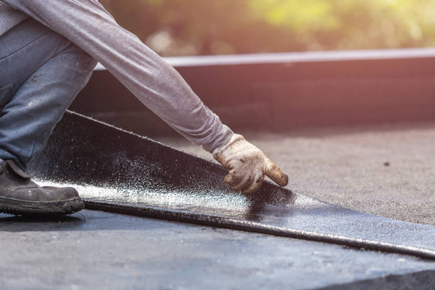 Professional Waterproofing technician working in Woodstock, IL